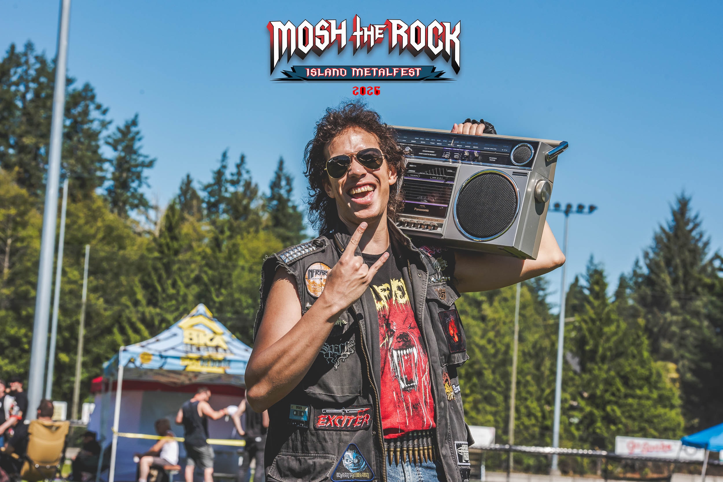 Fan carrying a boombox at Mosh the Rock Island Metalfest 2025
